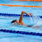 Demonstrating the basic skills in swimming