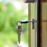 Black Handled Key on Key Hole - Meaning of security