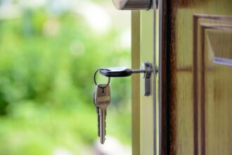 Black Handled Key on Key Hole - Meaning of security