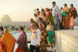 people standing near swimming pool