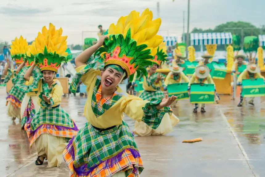 Motifs in dance: Vibrant dancers in traditional costumes perform at a lively festival in Western Visayas, Philippines.